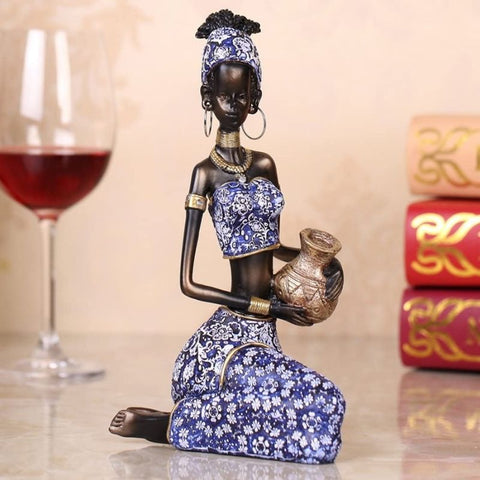 statue femme africaine assise