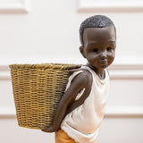 Statue enfant afrique