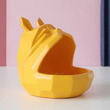 Statue tête chien jaune