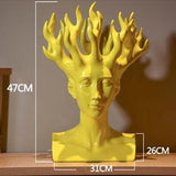 Statue tête vase