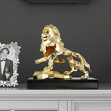 Statue lion en or