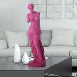 Statue femme grecque rose.
