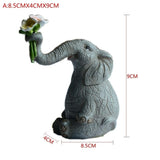 taille statue éléphant avec fleur