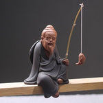 Statue homme qui pêche