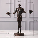Statue homme barre de musculation