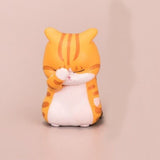 Statue de chat orange